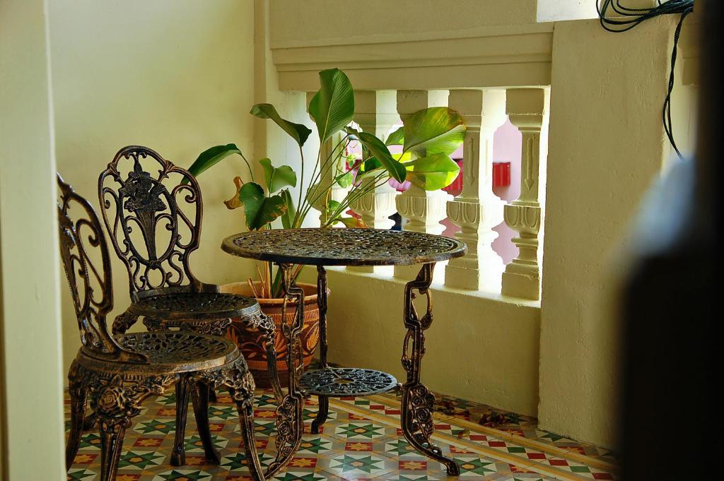 Palanquinn Heritage Suites George Town Room photo